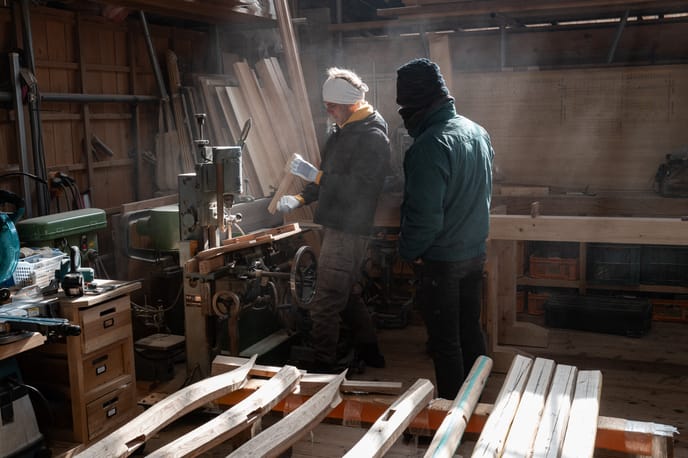 Apprentices scribing nuki for the sukiya fence project (late Winter)